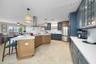 Beautiful two tone coastal kitchen - Cabinets by Medallion
