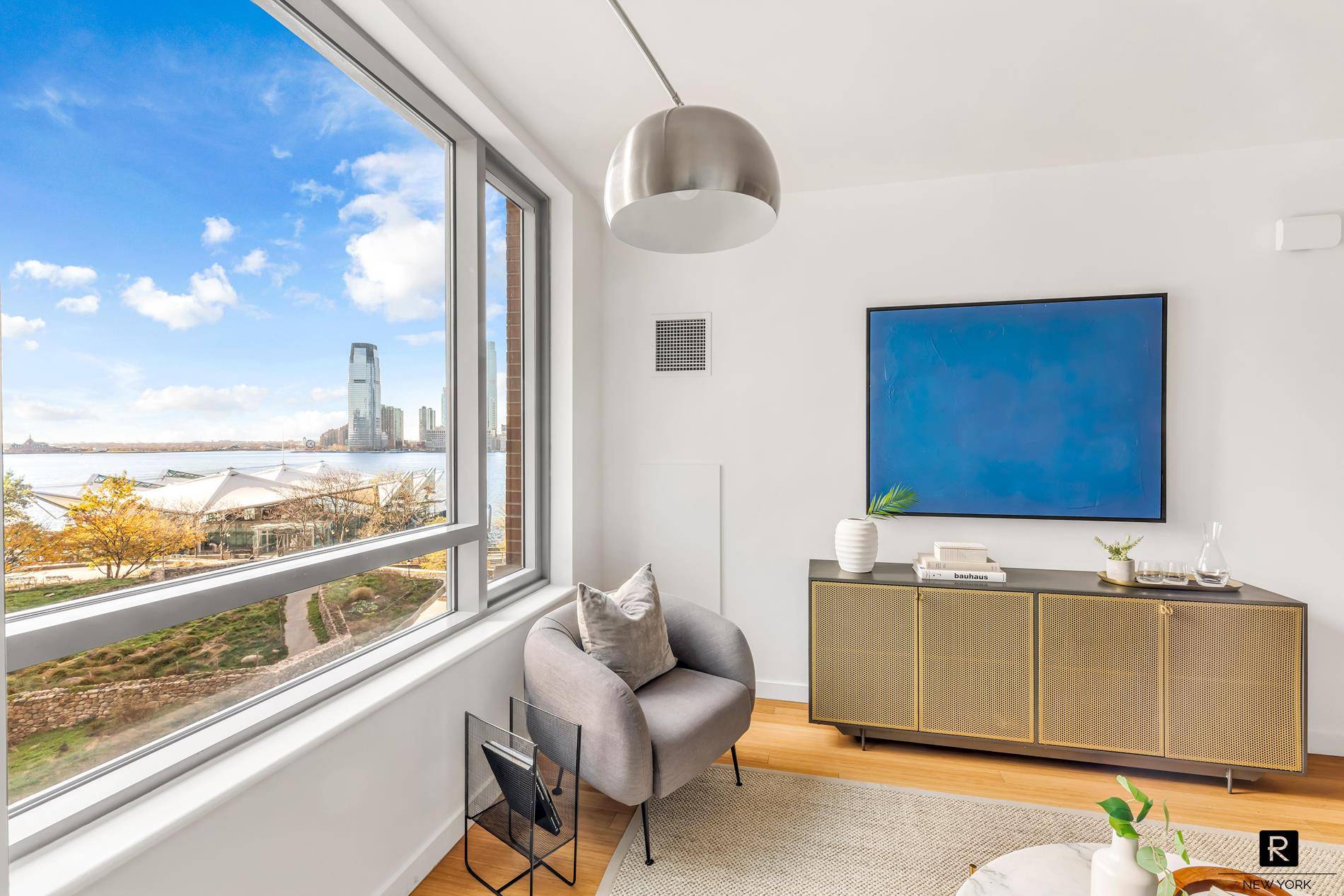Quintessential two bedroom two bath apartment with Hudson river views in the Riverhouse, the only water front LEED Gold rated green condominium in North Battery Park West Tribeca.