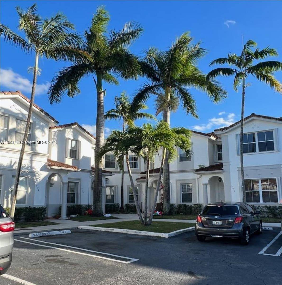 This spacious townhouse, located in the prestigious gated community of 'Costa Linda' in Doral City, offers luxurious living with its generous dimensions and modern amenities.