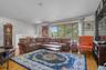 living room features hardwood floors