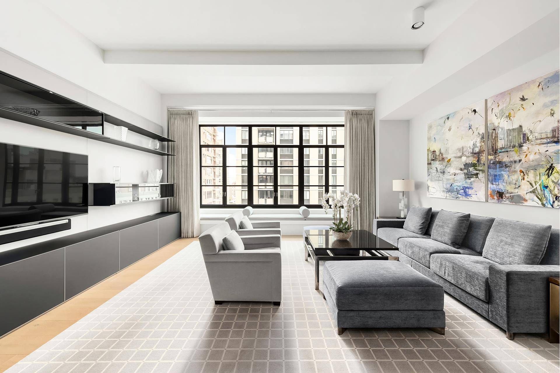 CLASSICAL GRANDEUR ON PARK AVENUE SOUTH The largest and highest floor two bedroom, two and a half bath residence at Huys.
