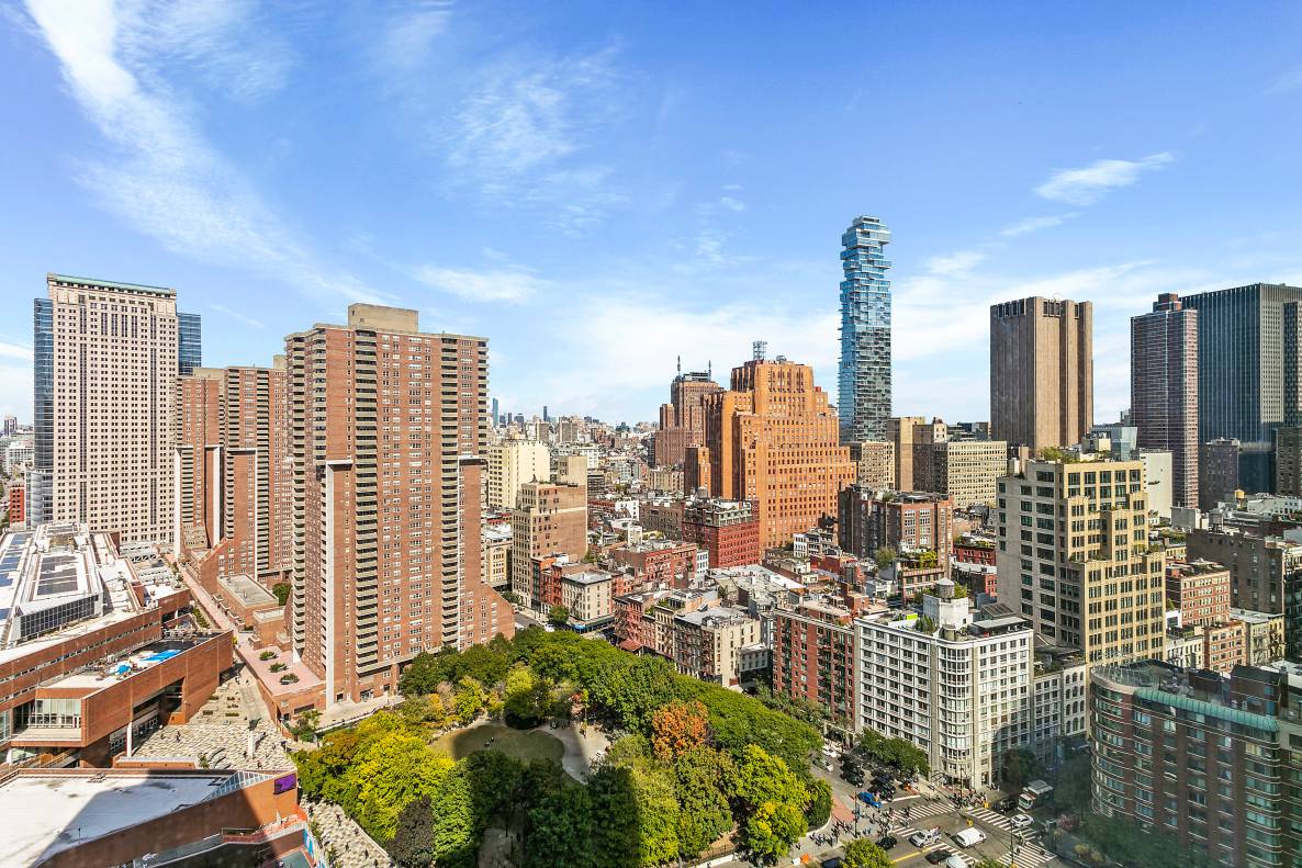 Enjoy breathtaking city and river views from every room of this winged two bedroom, two and a half bath prime, TriBeCa apartment.