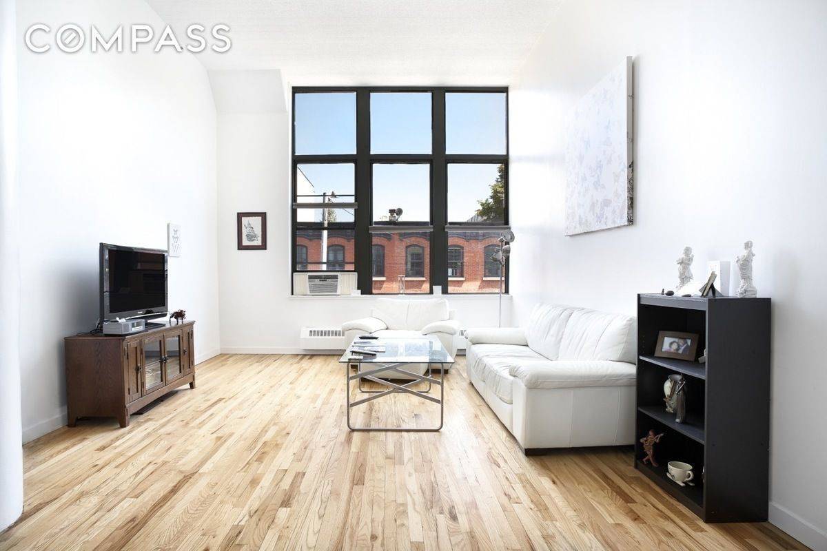 This delightful 2 bedroom 2 bath loft located at the famed Candy Factory Lofts is the definition of a truly unique apartment.