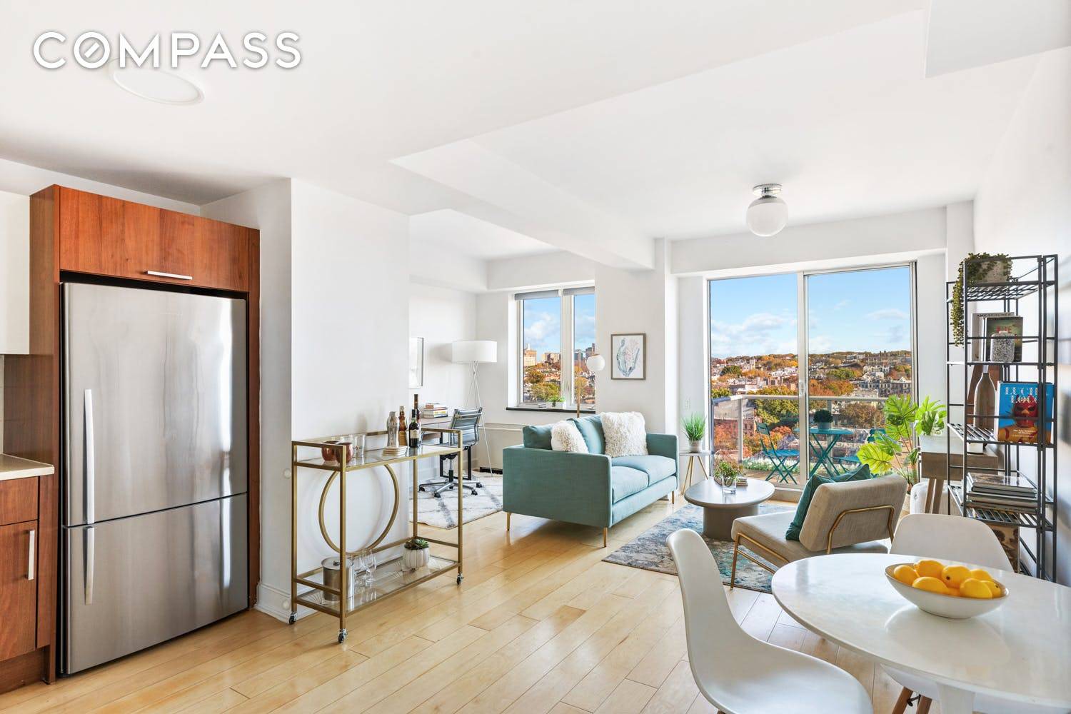 Sweeping penthouse views await at this large 1 bedroom 1 bath full service condo with additional flex space that's awash in gorgeous light and complete with a private balcony !