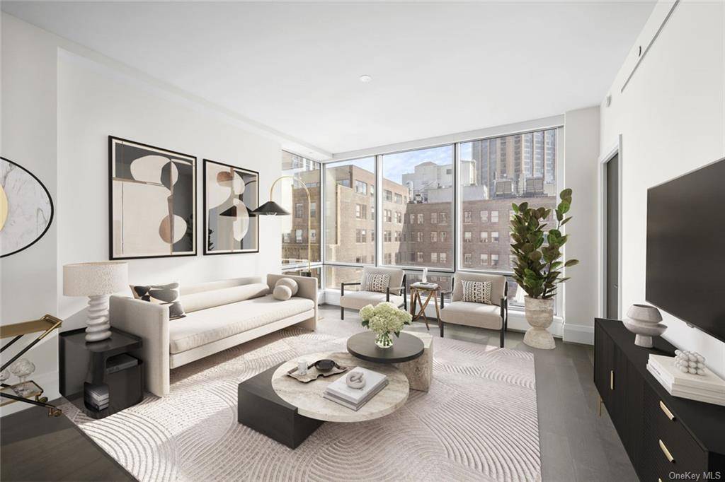 Enjoy stunning views of the Empire State and Chrysler Buildings in this Shamir Shah designed corner condo, an immaculate 2 bedroom, 2.