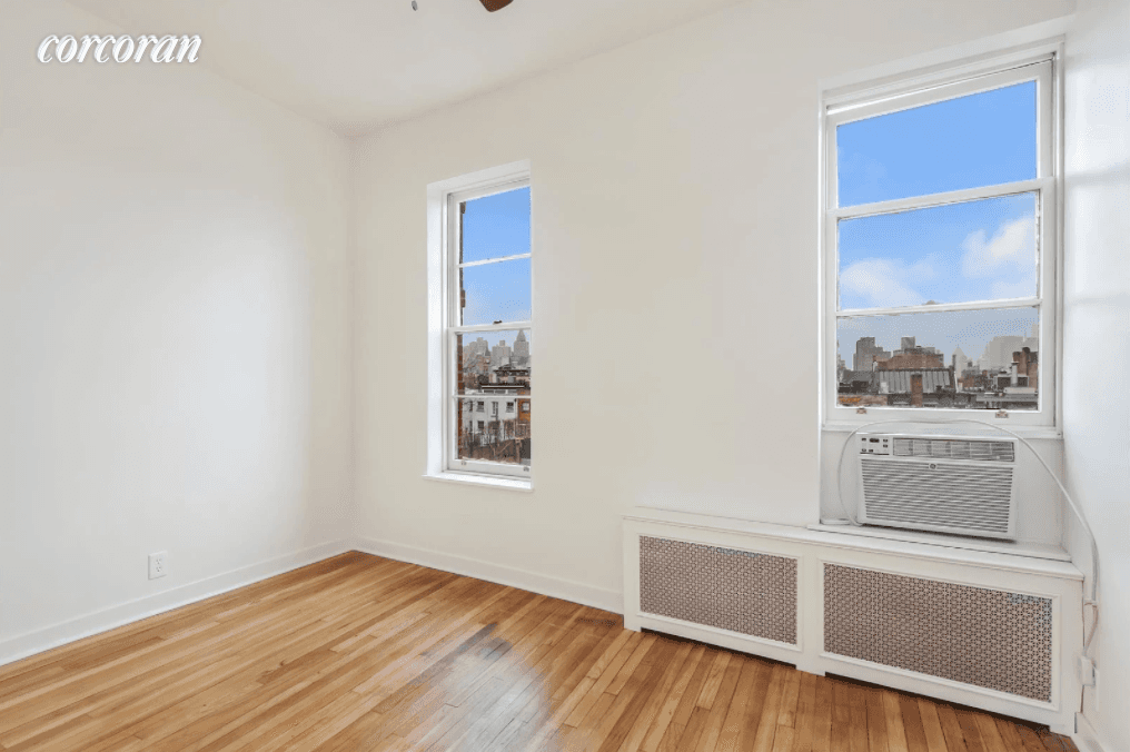 Perched on the top floor of this 2 bedroom apartment has undergone a complete renovation and features a large skylight in the living room that streams light all day long.