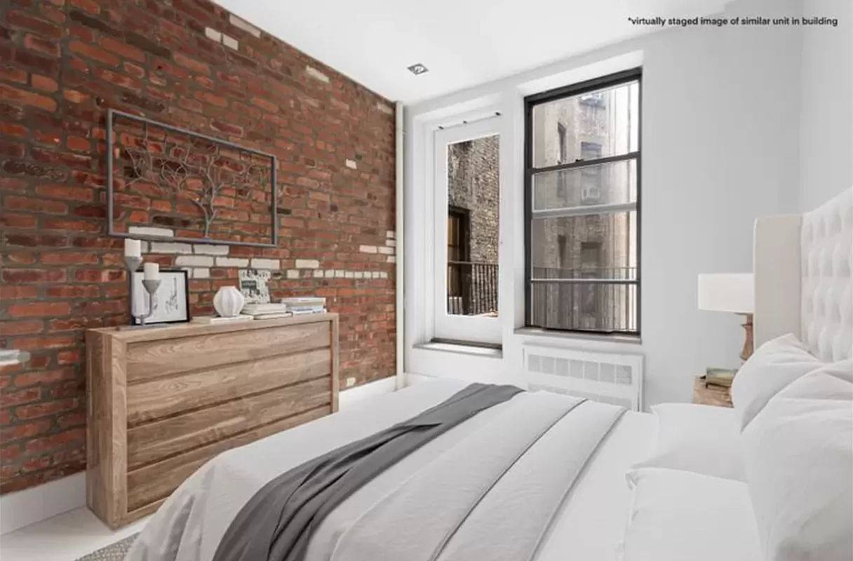 PLEASE EMAIL US FOR VIDEO OF THE ACTUAL APARTMENTNicely renovated TRUE 2BR with in unit laundry and PRIVATE OUTDOOR SPACE in the heart of Nolita !