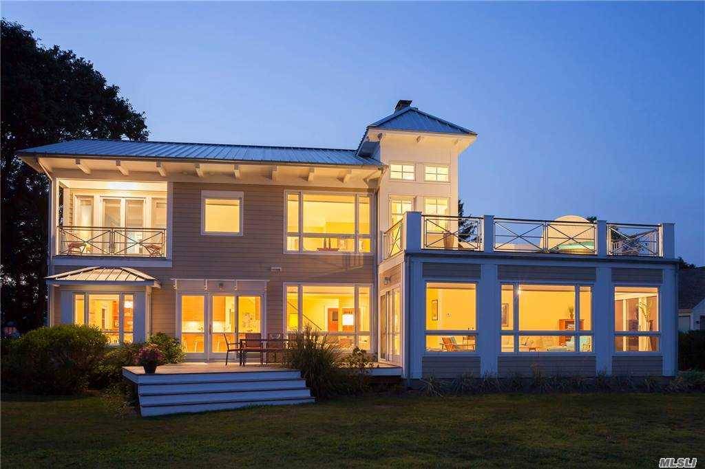 Located in Southold Shores, this architect's own home is built with all the beautiful appointments you can imagine.