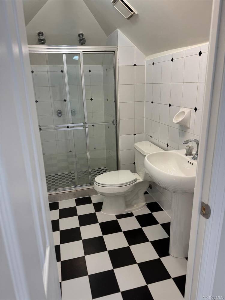 Discover urban living at its finest in this beautifully renovated 4 bedroom, 2 bathroom duplex apartment, nestled on the serene second and third floors of a charming multifamily home.