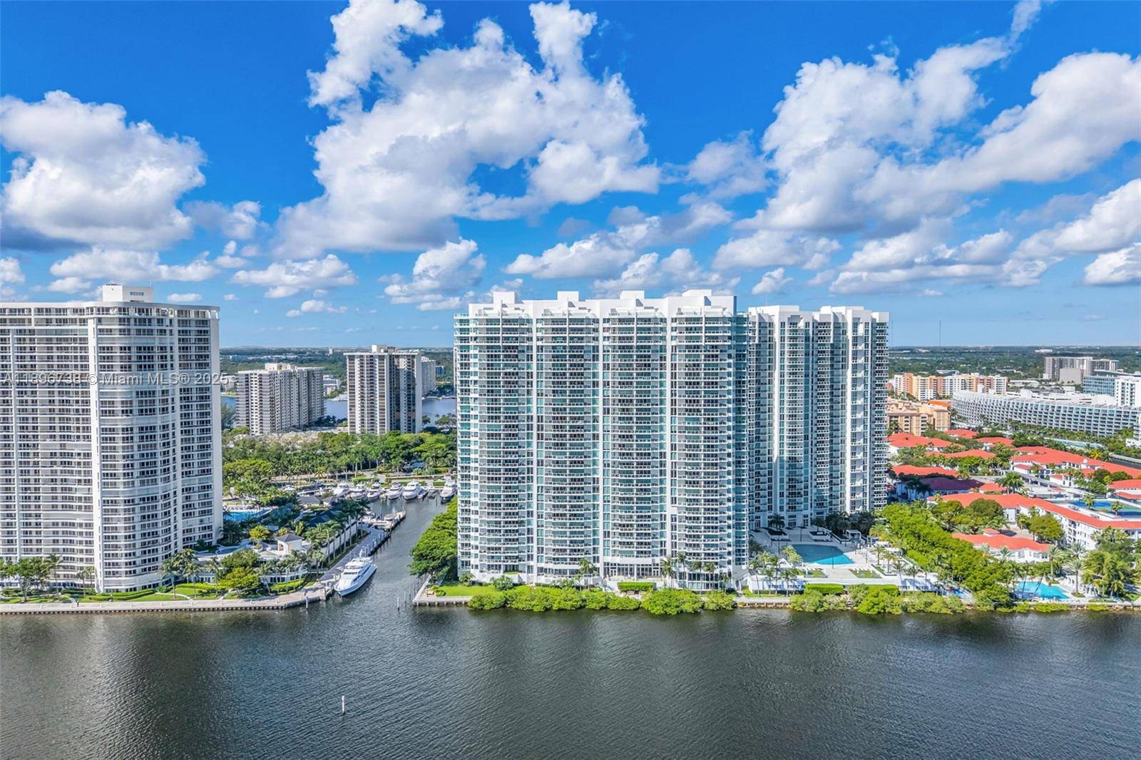 Luxury 3 bed Den 3 bath residence at Peninsula I Aventura with 3, 264 SF of elegant living space.