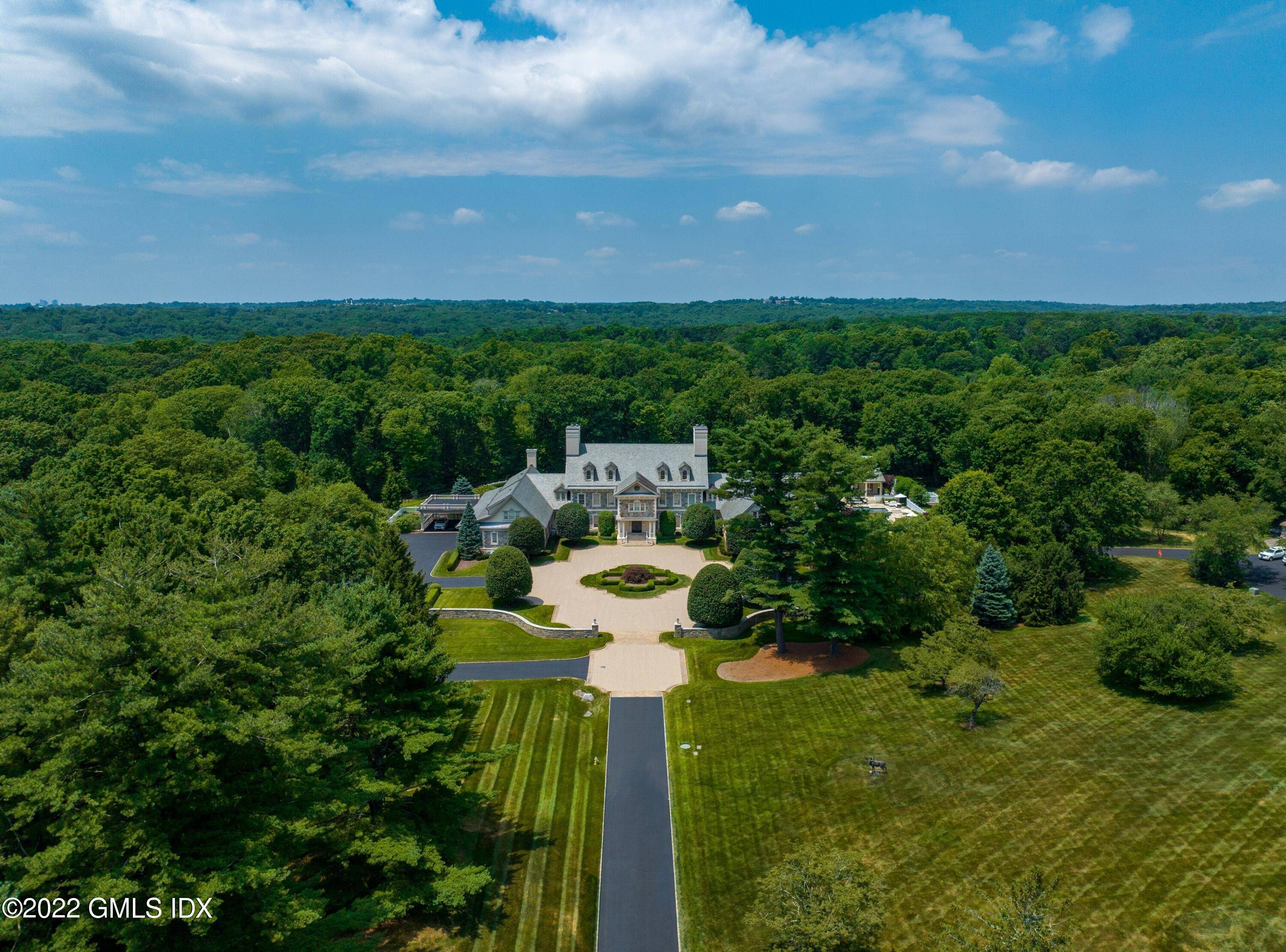 Truly unique 19 acre property with custom built 2009 grand estate in the heart of mid country Greenwich.