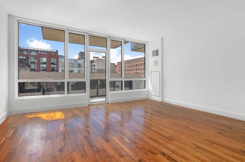 Welcome home to Unit 4H, a spacious, bright, and luxurious sought after Williamsburg studio with a large private balcony.