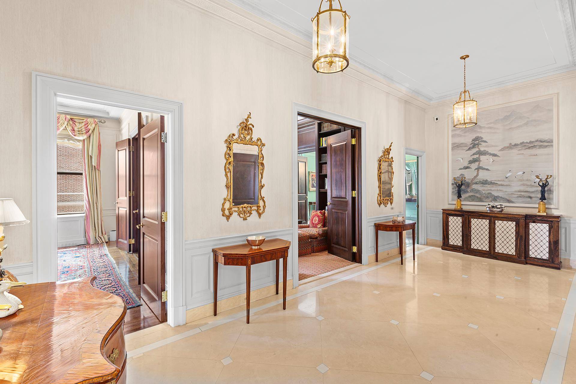 Step out of your private elevator vestibule into the entrance gallery and be greeted by a light filled Park Avenue home with large windows and nearly 11.