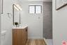Upstairs bathroom with walk-in
