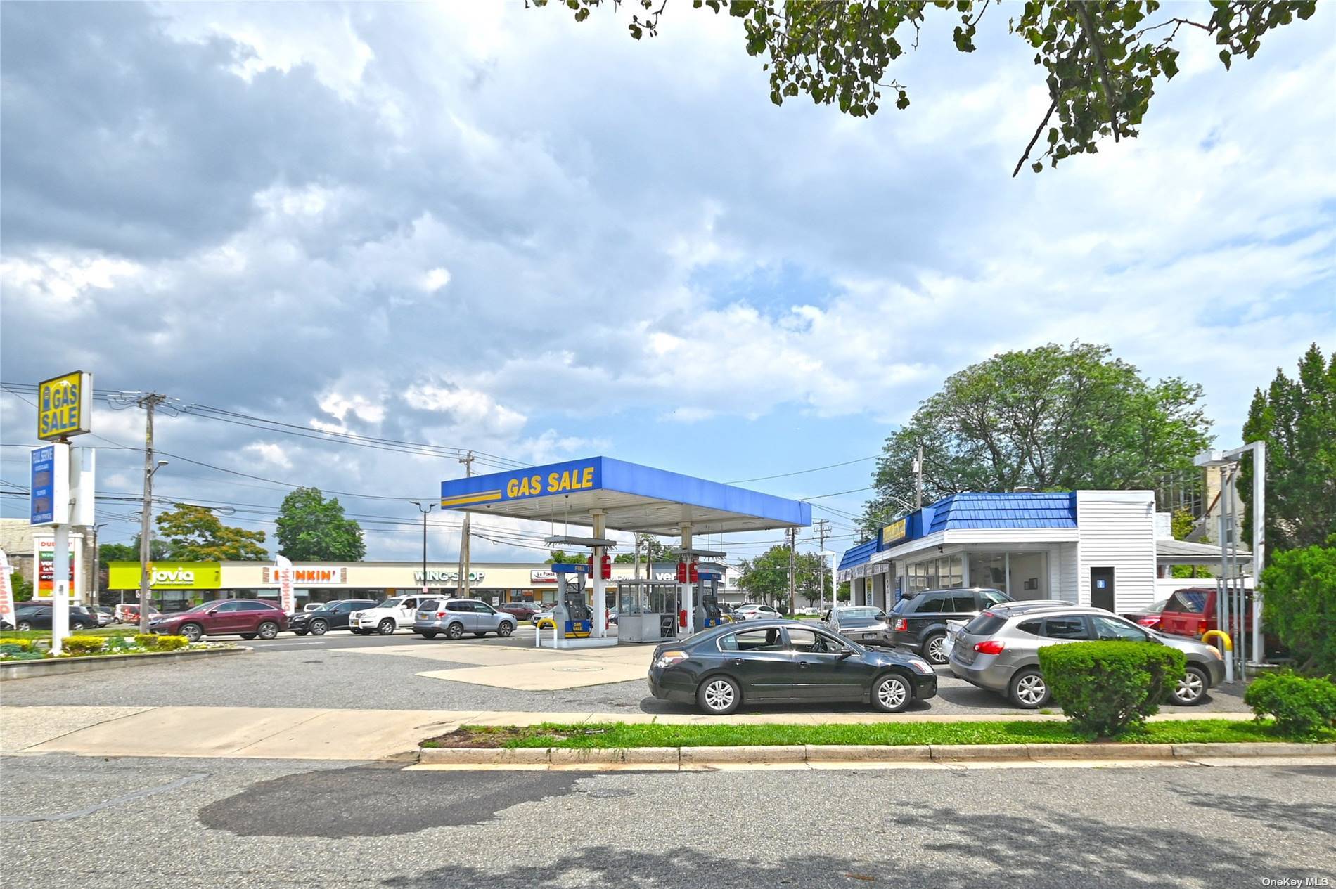A corner gas station and repair shop on a prime well traveled road situated at the corner of Front Street a major thoroughfare on LI in Hempstead.