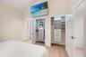 Primary bedroom closets with custom built ins