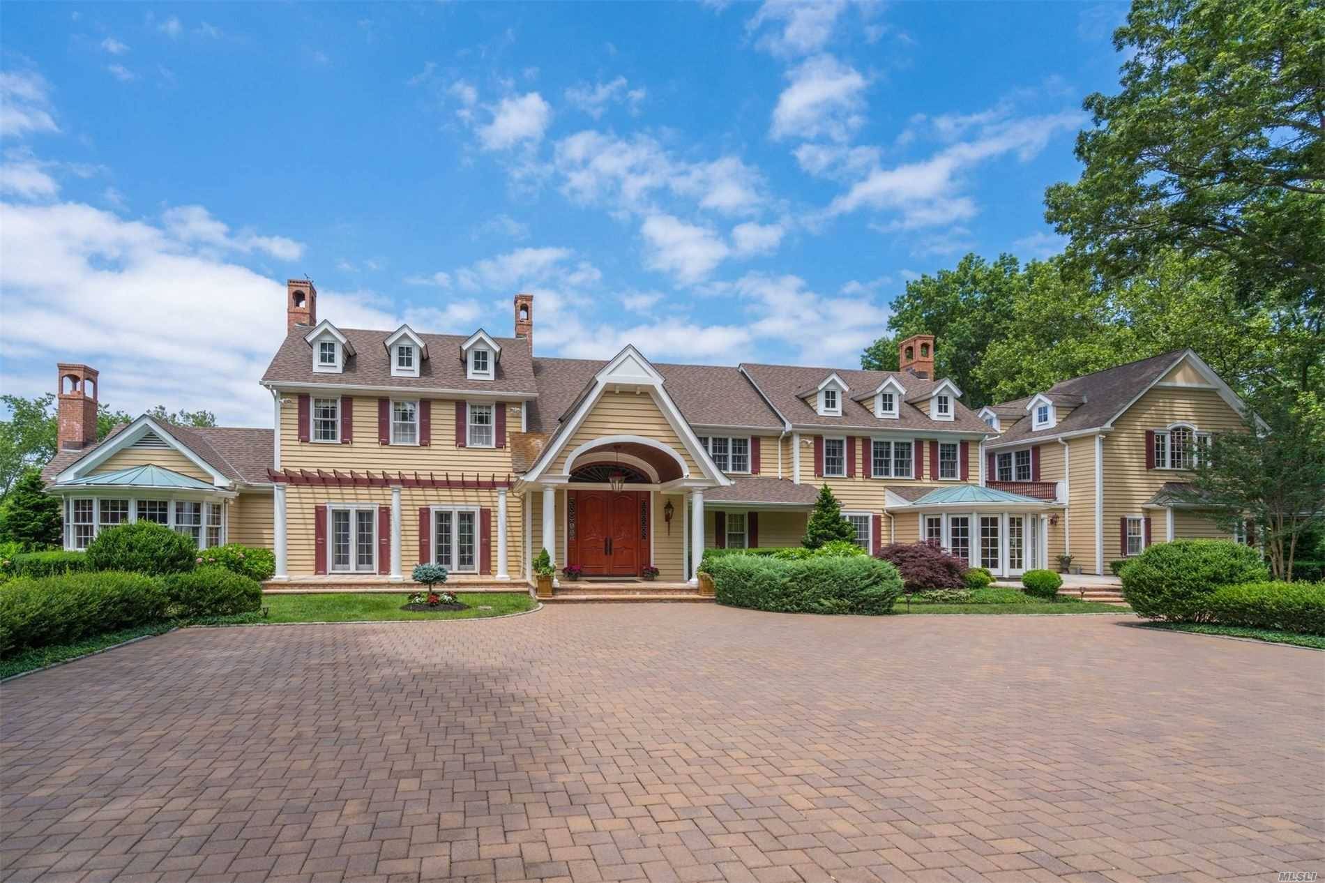 Enjoy Panoramic Sunsets Over The Li Sound From This Fabulous 8 acre Waterfront Estate Complete W Pool, Tennis Ct, and 3 Car Garage W Guest Quarters.