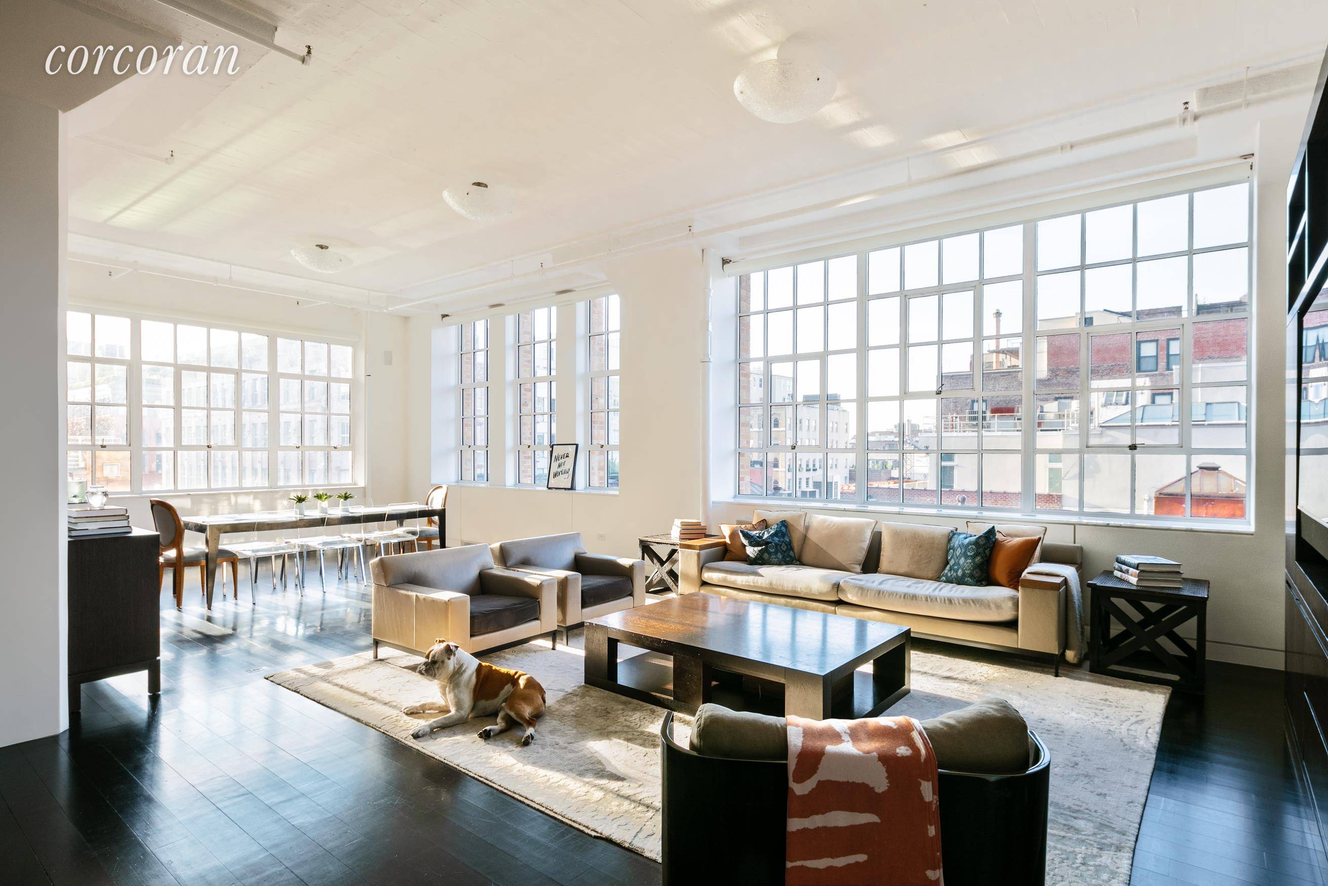 Experience spectacular true loft living in this palatial four bedroom, three and a half bathroom residence in a TriBeCa industrial Art Deco condominium.