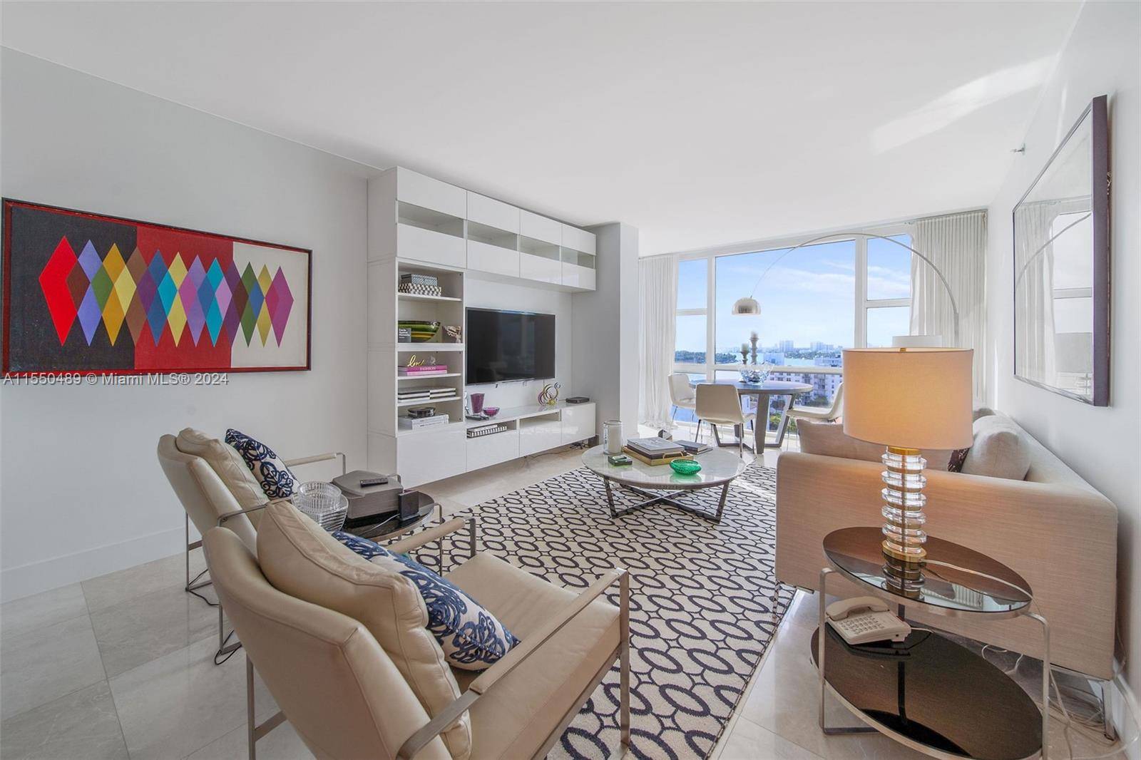 Rarely offered west facing corner spacious, beautifully furnished turn key unit with 2 large bedrooms, 2 zone A C in Center Tower at Carillon Miami Wellnes Resort, a premier oceanfront ...