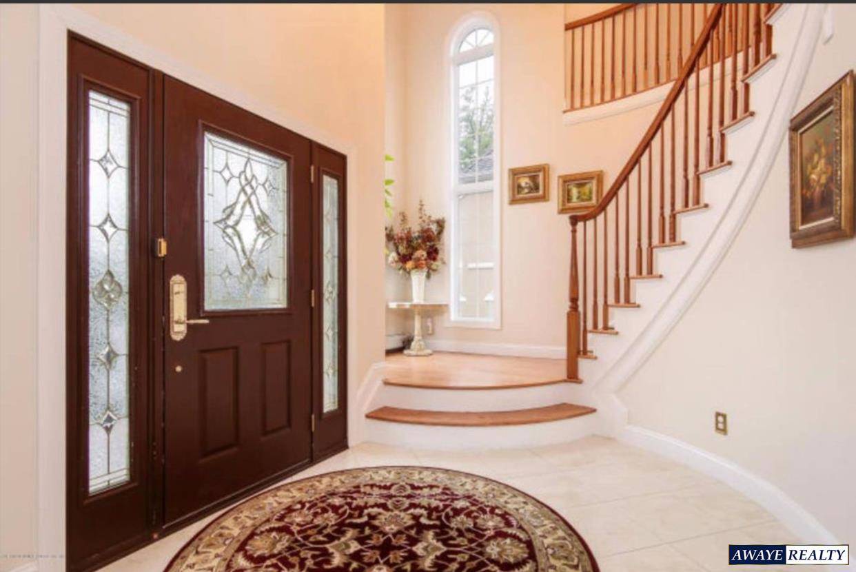 This Impressive home is full of extras and welcomes you home upon entering the 2 story foyer.