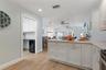 Kitchen and entry to laundry room and garage