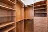 1 of 2 walking closets in the primary bedroom