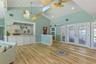 Open Floor Plan. Living Room facing South to the Chef's Kitchen and Dining Area