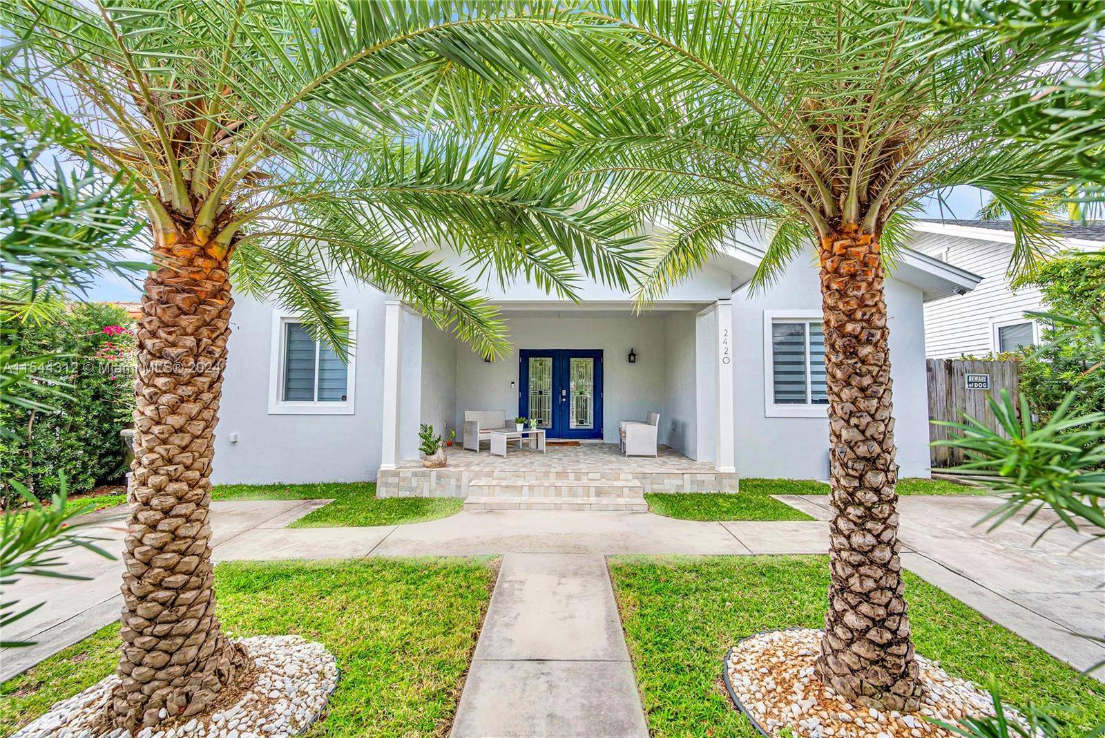 Nestled in the desirable Coral Way neighborhood, this modern single family home, built in 2014, boasts 4 bedrooms and 2.