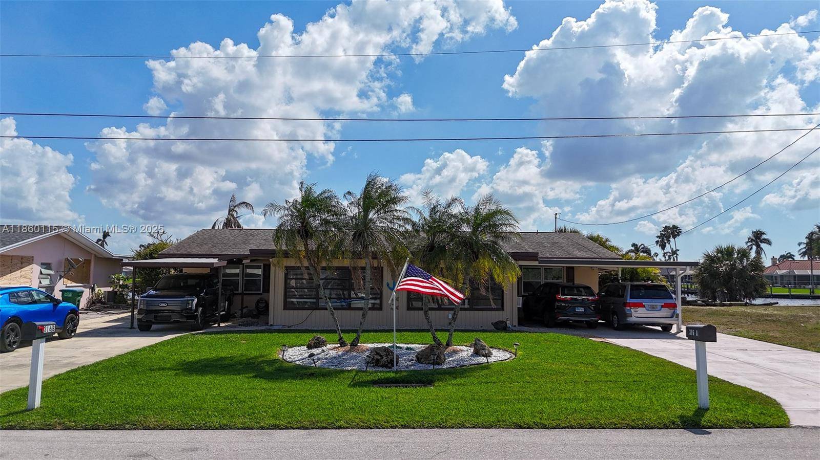 Waterfront ! Room for two boats 38 feet or longer.