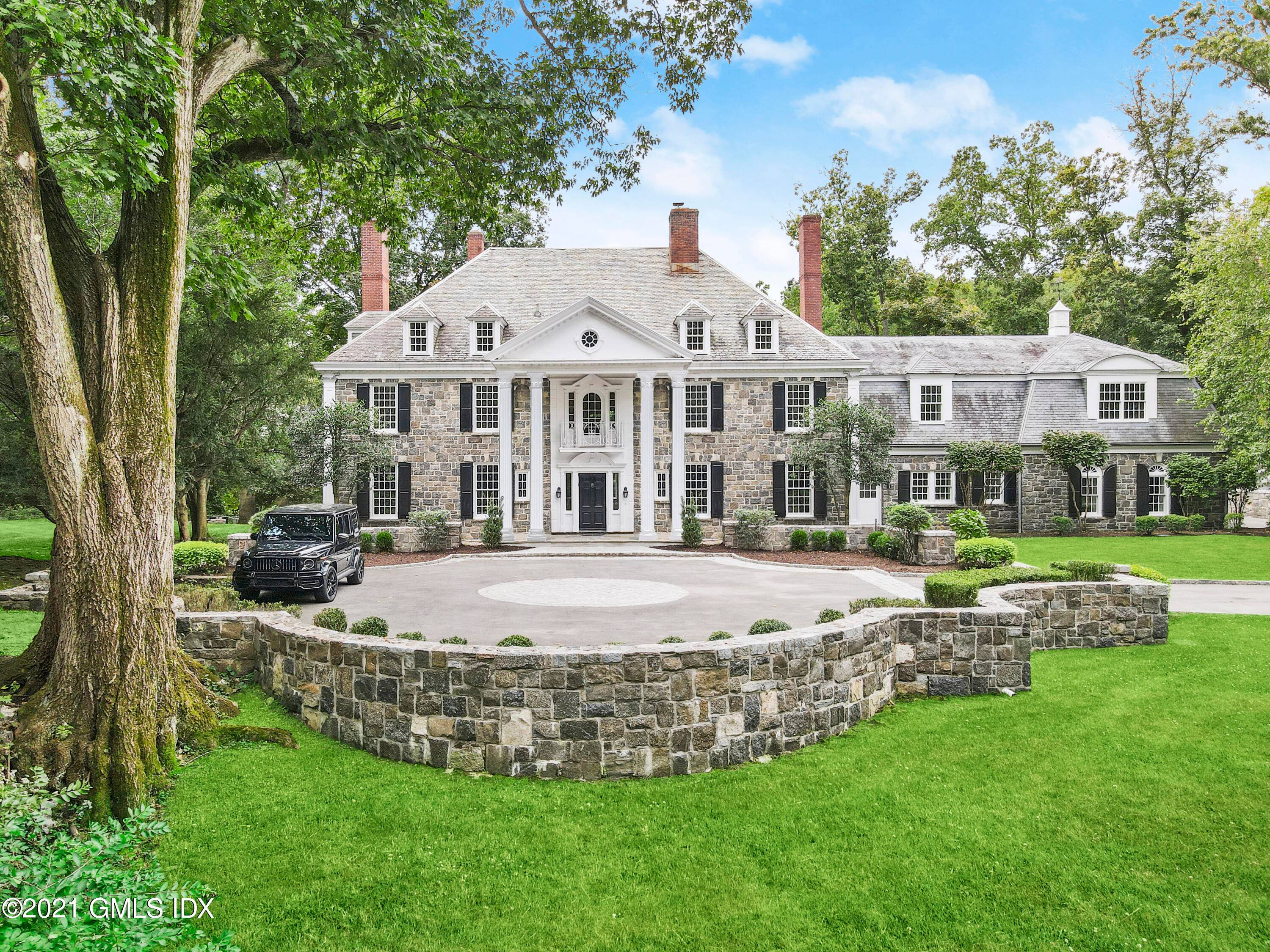 A classic stone Georgian with incredible detail, renovated from top to bottom, on a revered and quiet lane near town w almost 5 acres, pool and tennis court.