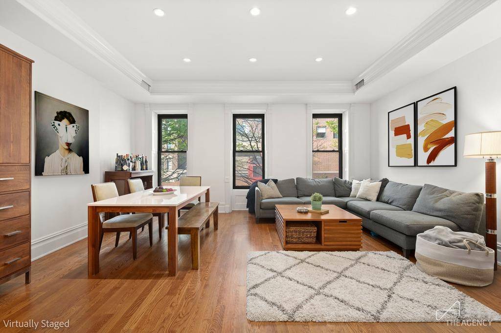 Welcome home to Unit 2 at 482 7th Street, a three unit prewar Brownstone condo nestled in the heart of Park Slope.