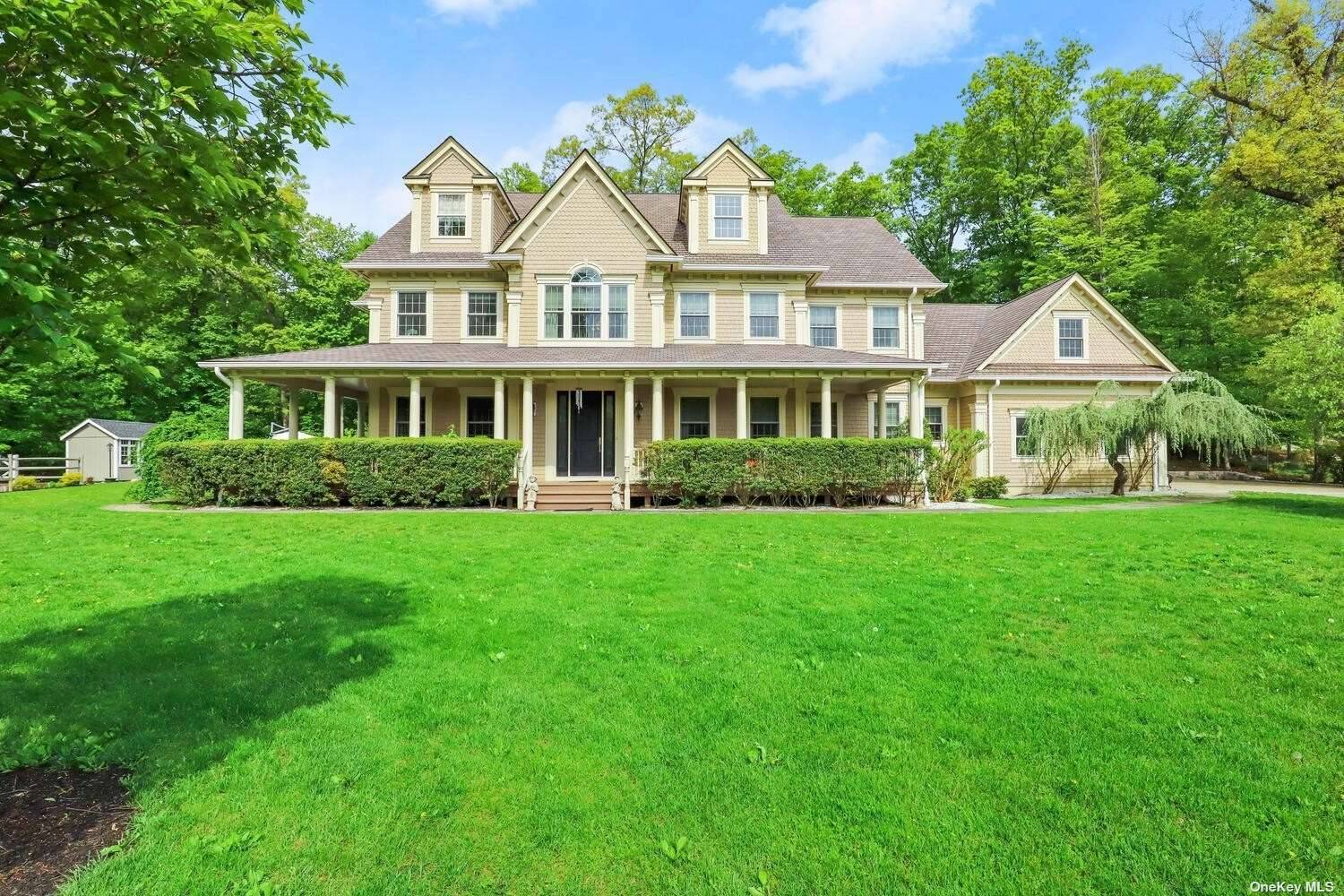 Amazing 6 bedroom 7 1 2 bath colonial features a dramatic formal entry, gorgeous crown, detailed hardwood floors, trey ceilings as well as French doors to a wrap around front ...