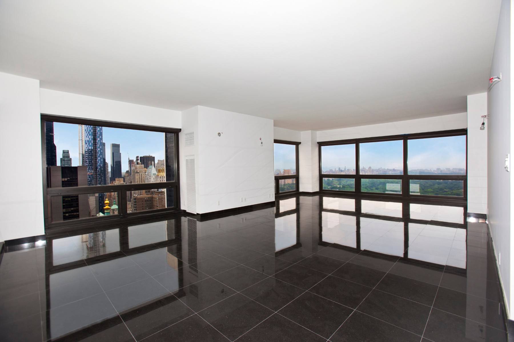 The rare and fabulous J line apartment in excellent condition with a new kitchen and granite floors in the premier corner of Trump Tower has come to the market.