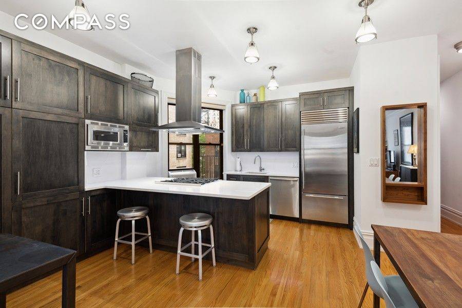 Meticulously renovated, true 2BR with a spectacular chef's kitchen and incredible entertainment space !