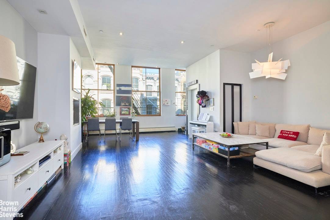 The epitome of stylish Soho living, unit 4 at 461 Broome Street is a full floor loft residence currently configured as a two bedroom, two bathroom apartment.