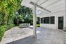 Another view of the covered and open patio area, perfect for entertaining or great space for an outdoor kitchen area!