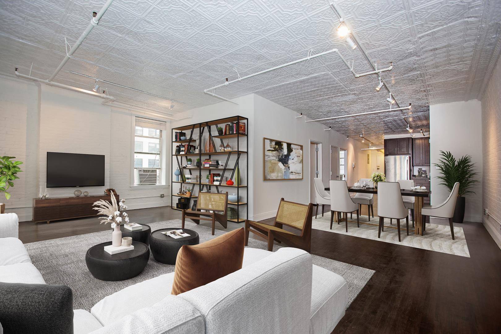 Dramatic loft with an expansive open layout, pleasant exposed white brick, accented gorgeously by dark hardwood floors throughout the home.