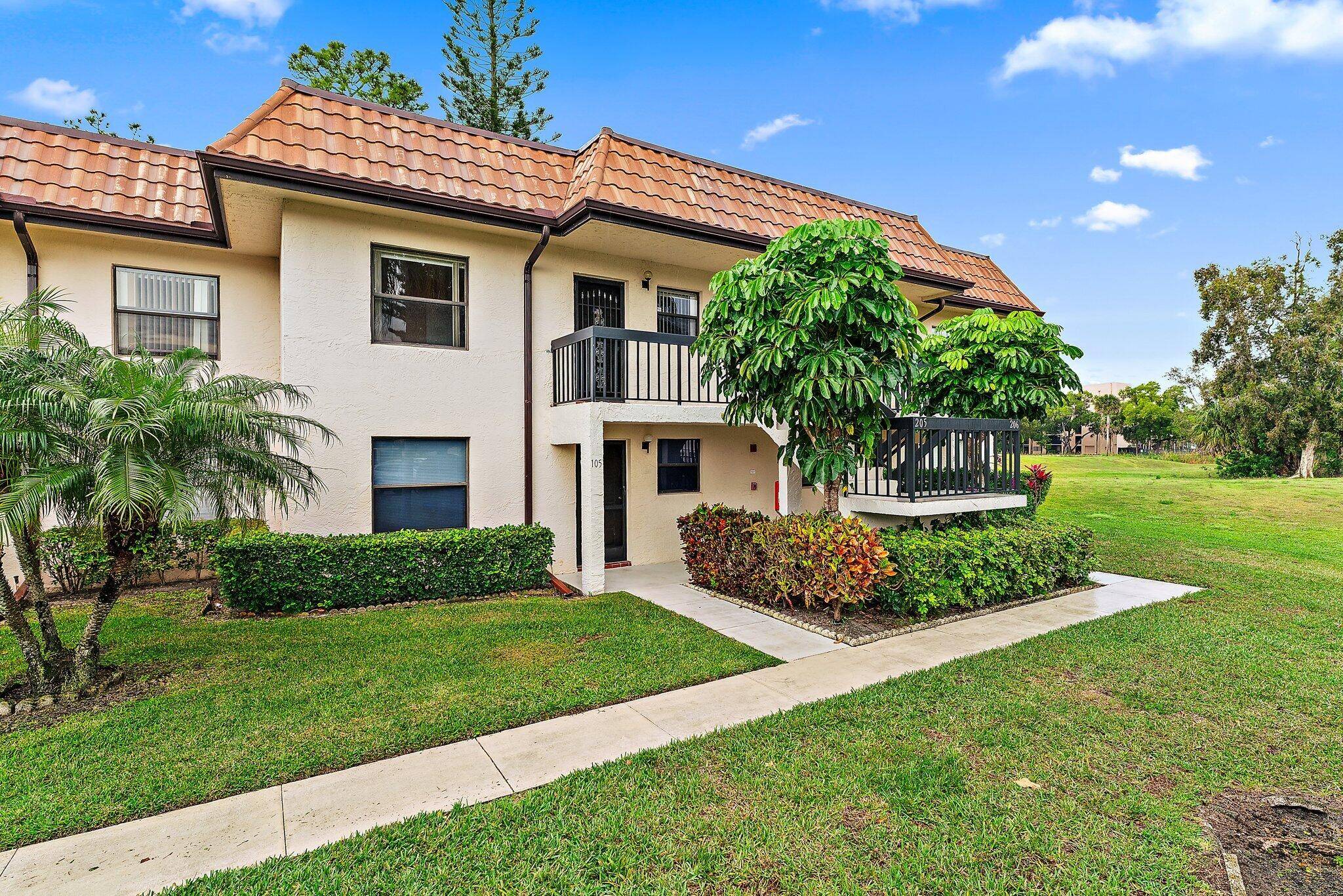Welcome to your serene oasis in Lake Worth, Florida in this exquisite 55 corner unit condo.