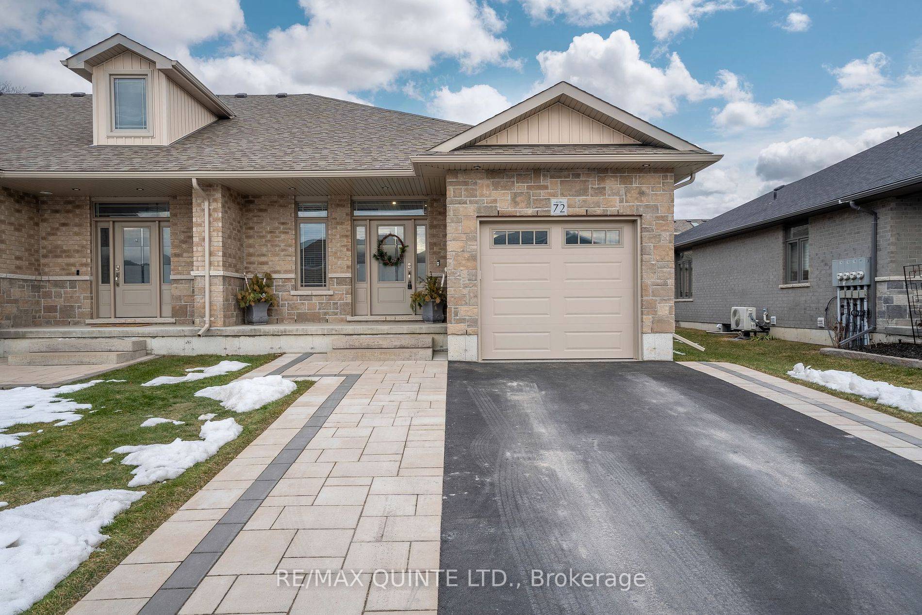 This stunning end unit townhome is arguably the most detached like townhome in the most convenient location, Belleville North.