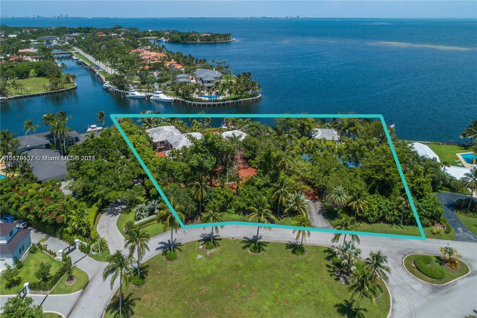 Once in a lifetime opportunity to own the largest and most exclusive waterfront lot in all of Old Cutler Bay !