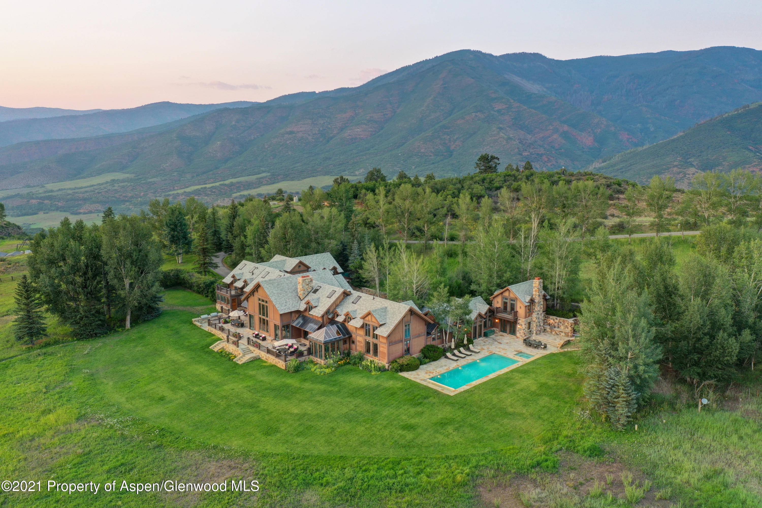 Serenity awaits you at this extraordinary European inspired mountain estate just 12 minutes outside of Aspen in the exclusive Starwood community.