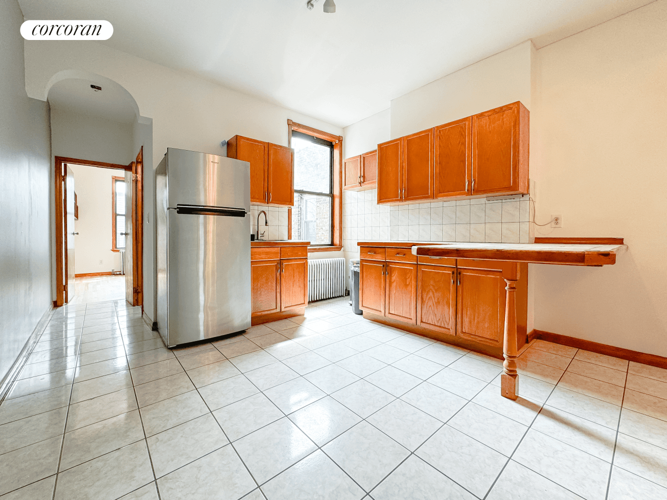 Situated on the top floor of a multifamily home, this railroad unit features two beds and one bath.