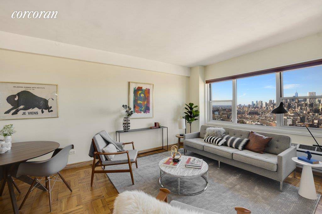 A converted 2 bedroom on the cusp of Prospect Heights and Park Slope with incredible sweeping views in a full service doorman building plus low maintenance !