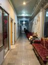 Hall featuring a textured ceiling