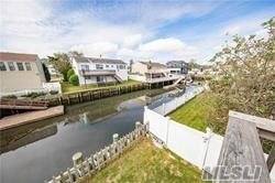 Spacious 5 Bedroom 2 Bath Waterfront Hi Ranch in the Madison Section of Oceanside.
