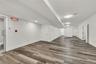 Finished below grade area with wood finished floors
