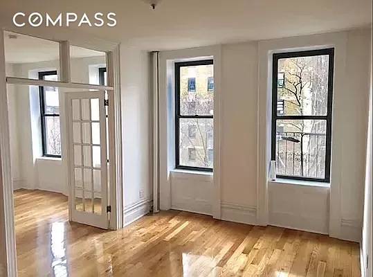 Spectacular 3 bedroom 2 bathroom apartment located in a beautiful walk up building.