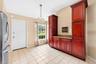 The Kitchen overlooks the Family Room and is ready for the home chef with NEW STAINLESS STEEL APPLIANCES, granite countertops, an abundance of wood ca