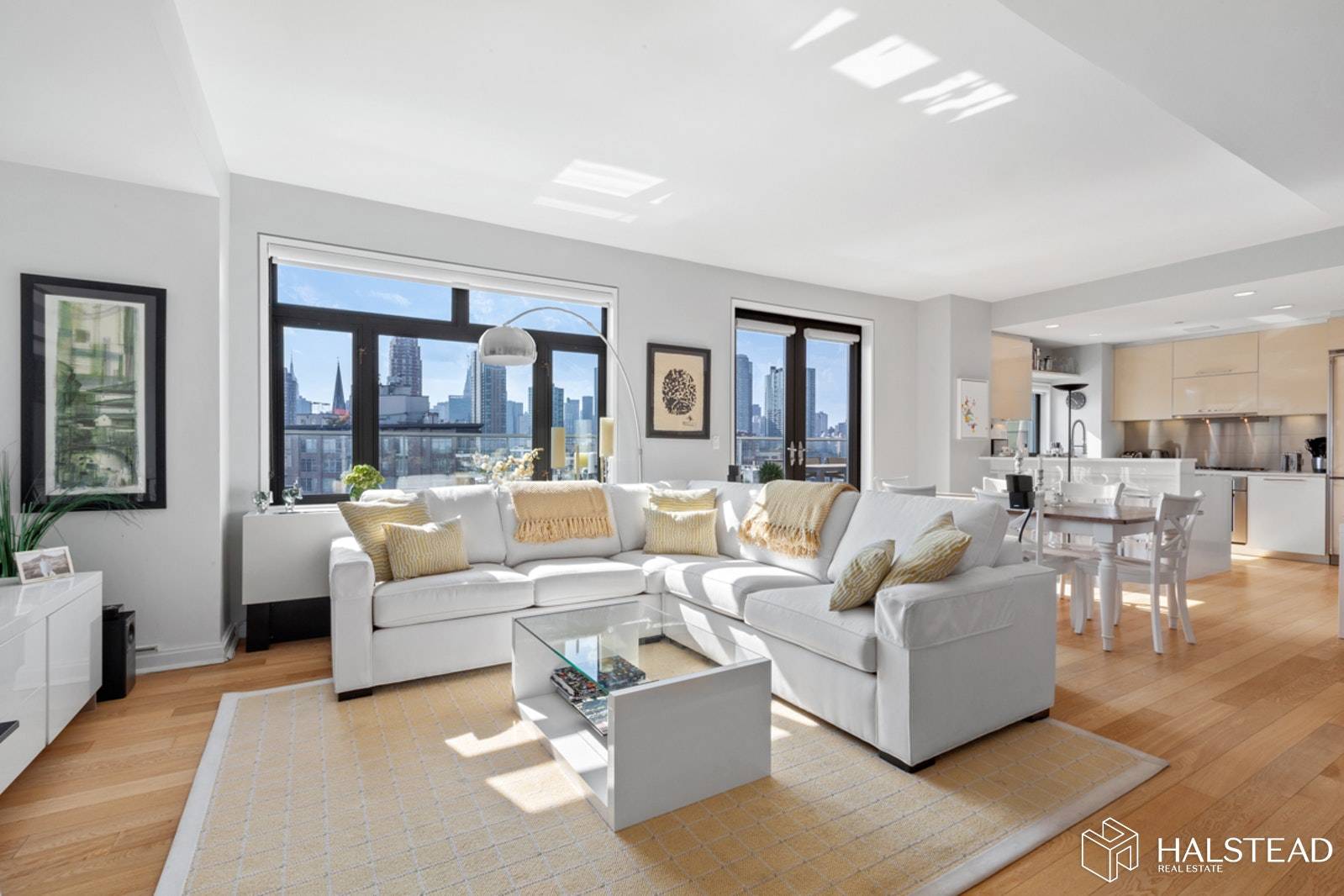 The Apartment With stunning views of NYC from every window, this bright Western facing 2BR 2.