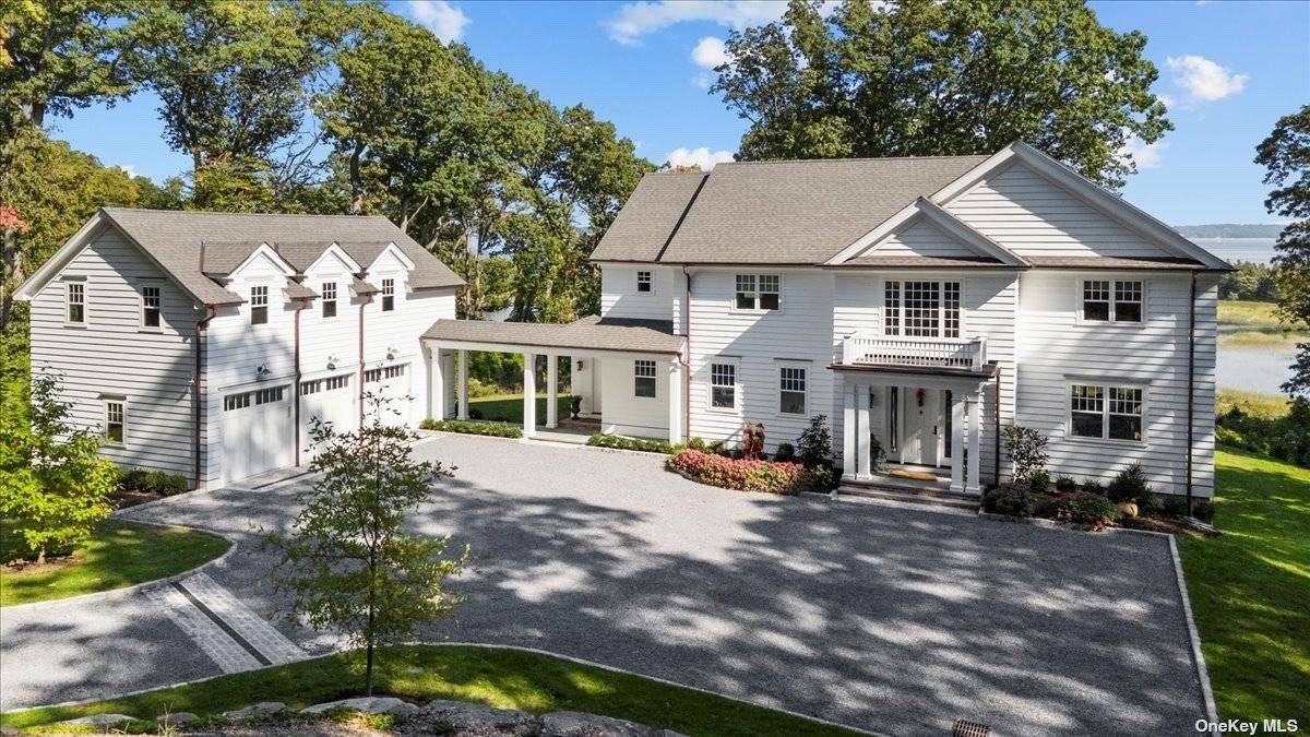 Nestled in the prestigious Village of Lloyd Harbor, this exquisite almost new construction waterfront home is a testament to timeless design and modern luxury.